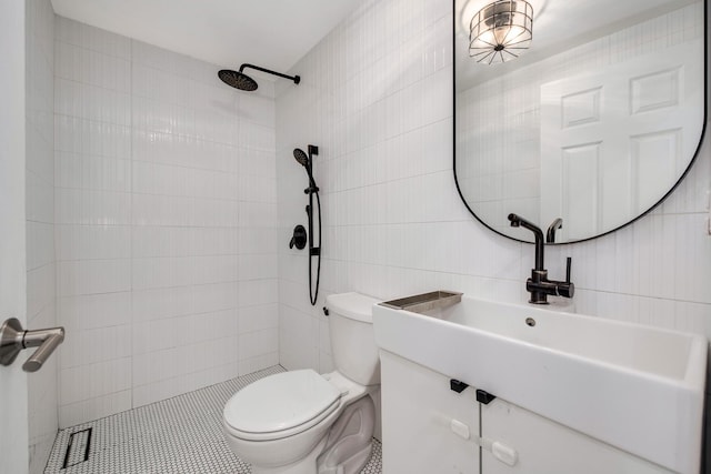 3306 W Lemoyne St, Chicago, IL 60651 - full bathroom with tile walls, tiled shower, toilet, and vanity
