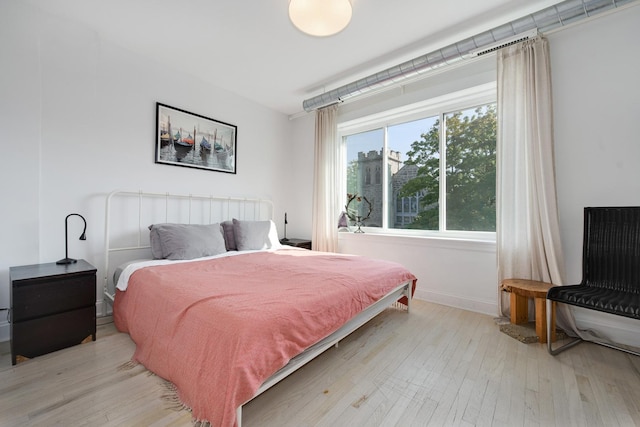 3306 W Lemoyne St, Chicago, IL 60651 - bedroom featuring light wood-style floors and baseboards