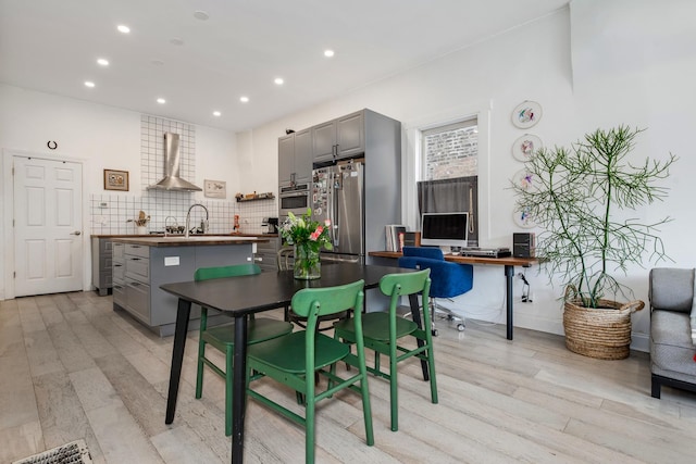 3306 W Lemoyne St, Chicago, IL 60651 - dining room with light wood-style floors and recessed lighting