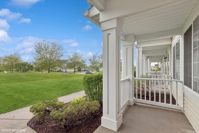 39674 N Warren Ln Unit 0, Beach Park, IL 60083 - covered porch featuring a lawn