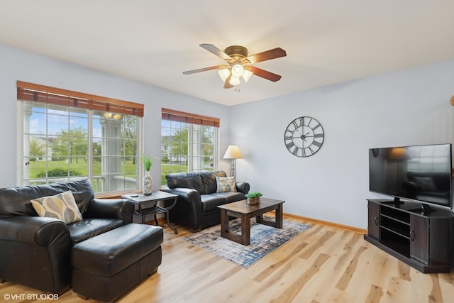 39674 N Warren Ln Unit 0, Beach Park, IL 60083 - living room featuring a ceiling fan, light wood-type flooring, and baseboards