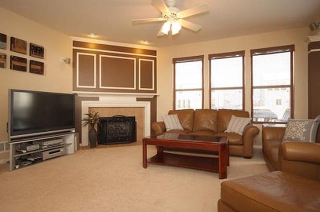 254 S Cranberry St, Bolingbrook, IL 60490 - living area with plenty of natural light, a ceiling fan, light carpet, and a fireplace
