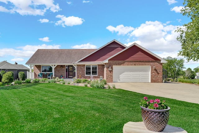 26710 S Foxwood Dr, Monee, IL 60449 - view of front of house featuring a porch, brick siding, driveway, and a front yard