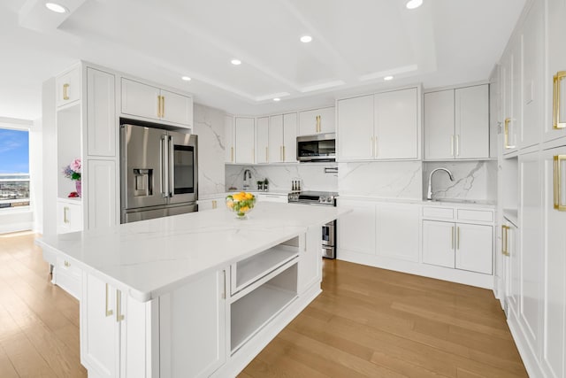 405 N Wabash Ave Unit 4308, Chicago, IL 60611 - kitchen with appliances with stainless steel finishes, recessed lighting, tasteful backsplash, and light wood finished floors