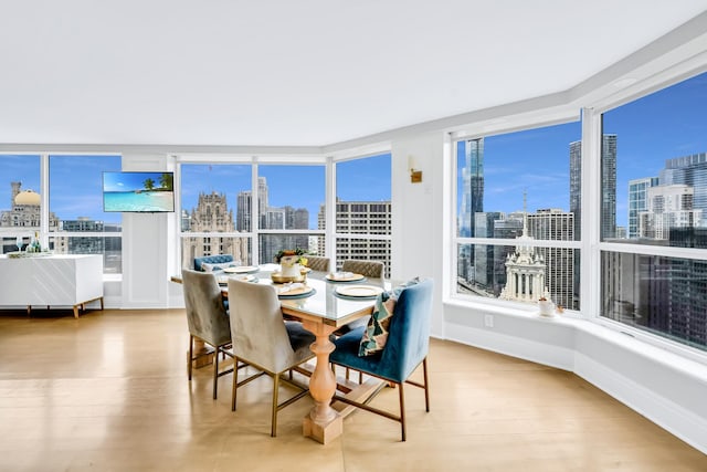 405 N Wabash Ave Unit 4308, Chicago, IL 60611 - dining space with baseboards and wood finished floors