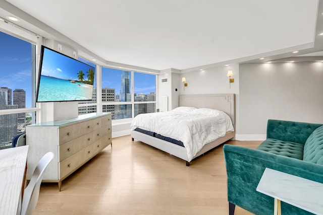405 N Wabash Ave Unit 4308, Chicago, IL 60611 - bedroom with recessed lighting, multiple windows, light wood-type flooring, and baseboards