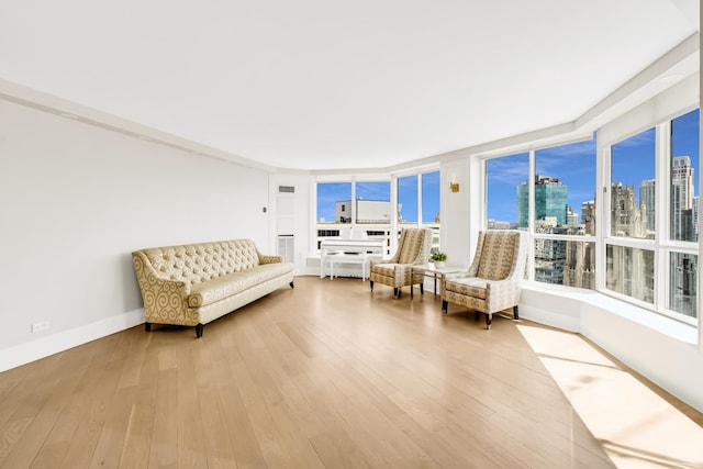 405 N Wabash Ave Unit 4308, Chicago, IL 60611 - sitting room with a skyline view, wood-type flooring, and baseboards