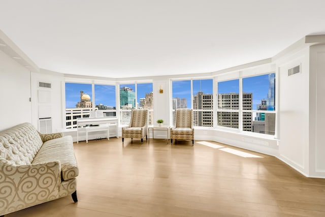 405 N Wabash Ave Unit 4308, Chicago, IL 60611 - living room featuring a skyline view and wood finished floors