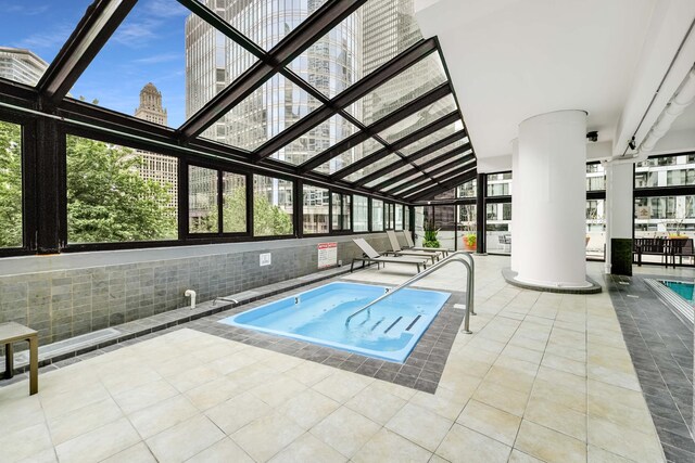 405 N Wabash Ave Unit 4308, Chicago, IL 60611 - indoor community pool with a view of city and an indoor hot tub