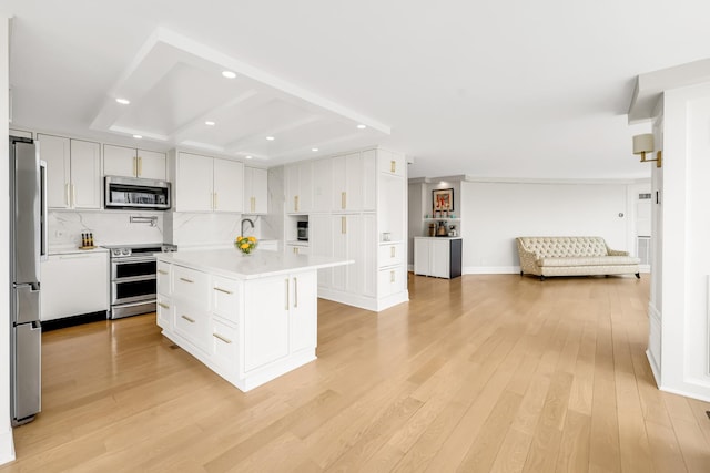 405 N Wabash Ave Unit 4308, Chicago, IL 60611 - kitchen with stainless steel appliances, recessed lighting, open floor plan, light countertops, and light wood-style floors
