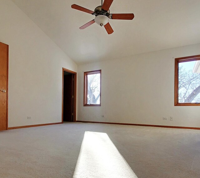 4301 Hickory Hill Ct, Johnsburg, IL 60051 - empty room with light colored carpet, vaulted ceiling, baseboards, and a ceiling fan