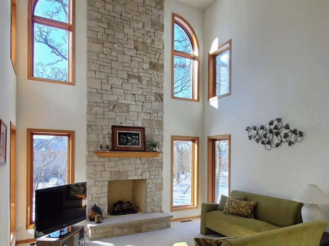 4301 Hickory Hill Ct, Johnsburg, IL 60051 - living area with a stone fireplace and a towering ceiling