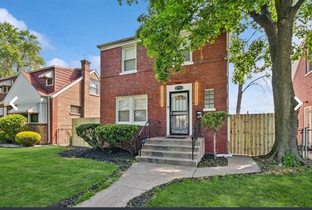 12923 S Lowe Ave, Chicago, IL 60628 - view of front facade featuring brick siding