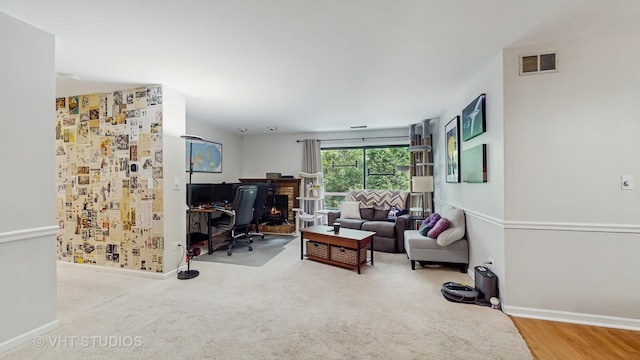 17 Creekside Cir N Unit D, Elgin, IL 60123 - living room featuring baseboards and an office area