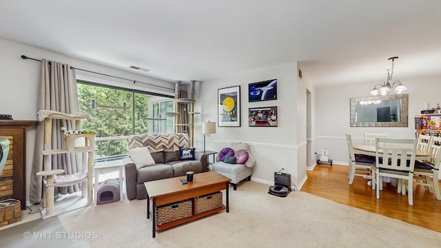 17 Creekside Cir N Unit D, Elgin, IL 60123 - living room with a chandelier and wood finished floors