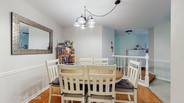 17 Creekside Cir N Unit D, Elgin, IL 60123 - dining room with wood finished floors, a chandelier, and baseboards
