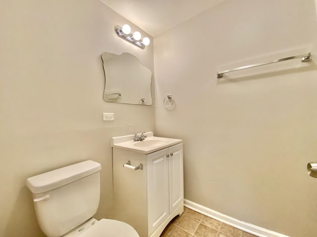 332 Gentry St, Park Forest, IL 60466 - bathroom featuring vanity, toilet, and baseboards
