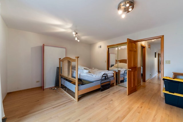 6856 W Montrose Ave, Harwood Heights, IL 60706 - bedroom featuring light wood finished floors and a closet