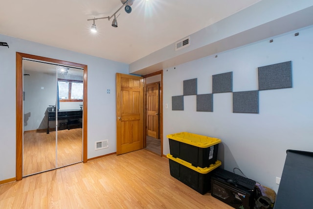 6856 W Montrose Ave, Harwood Heights, IL 60706 - bedroom with wood finished floors and baseboards
