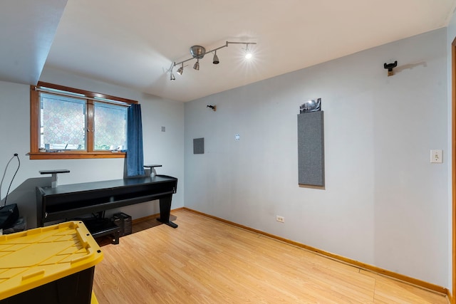 6856 W Montrose Ave, Harwood Heights, IL 60706 - miscellaneous room with light wood-style floors and baseboards