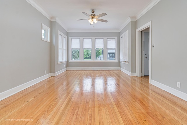 12155 S Normal Ave, Chicago, IL 60628 - unfurnished room with a ceiling fan, ornamental molding, light wood-style floors, and baseboards