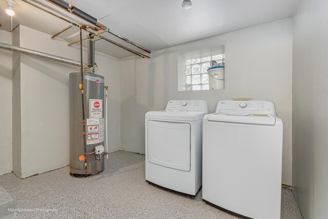 12155 S Normal Ave, Chicago, IL 60628 - washroom featuring water heater and washer and dryer