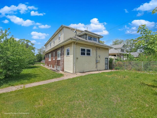12155 S Normal Ave, Chicago, IL 60628 - view of rear view of house