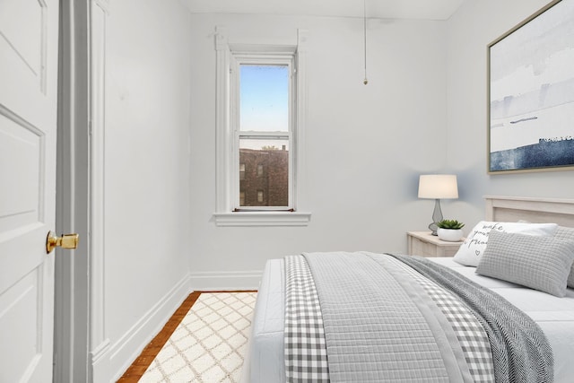 9035 S Burley Ave, Chicago, IL 60617 - bedroom featuring dark wood finished floors and baseboards