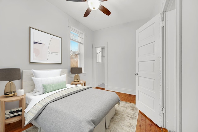 9035 S Burley Ave, Chicago, IL 60617 - bedroom with light wood finished floors, a closet, and a ceiling fan