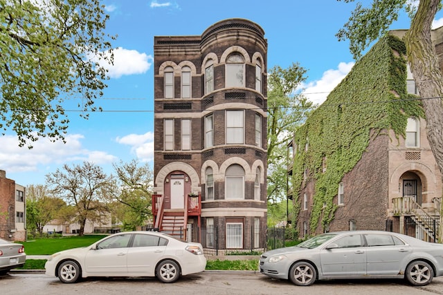9035 S Burley Ave, Chicago, IL 60617 - view of front of home featuring brick siding and stairway