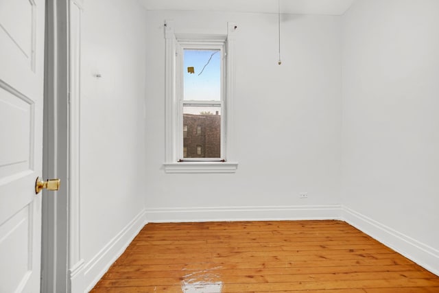 9035 S Burley Ave, Chicago, IL 60617 - empty room featuring light wood-style floors and baseboards