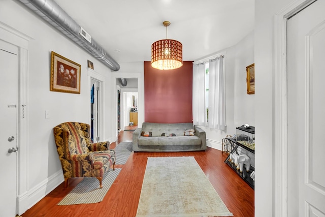 9035 S Burley Ave, Chicago, IL 60617 - living area with a chandelier and wood finished floors
