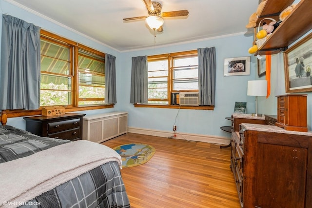 10716 S Hoyne Ave, Chicago, IL 60643 - bedroom featuring radiator heating unit, wood finished floors, baseboards, cooling unit, and crown molding