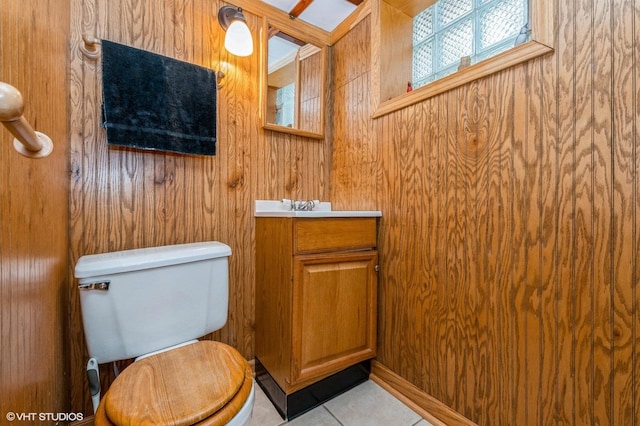 10716 S Hoyne Ave, Chicago, IL 60643 - half bathroom with toilet, vanity, tile patterned flooring, and wooden walls
