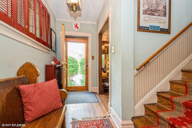 10716 S Hoyne Ave, Chicago, IL 60643 - entrance foyer featuring wood finished floors, stairs, baseboards, and crown molding