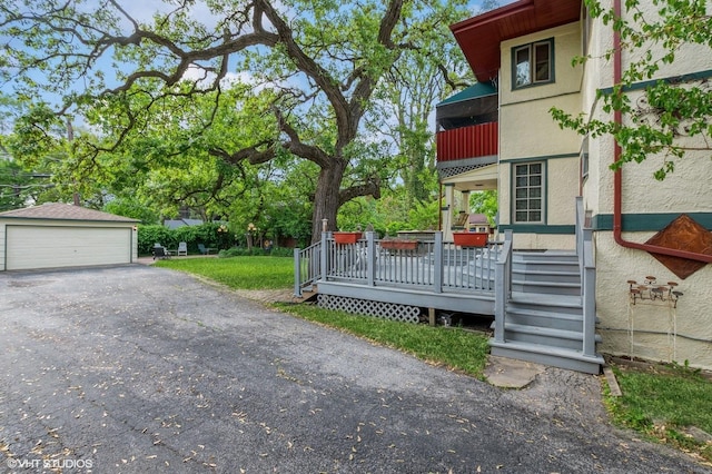 10716 S Hoyne Ave, Chicago, IL 60643 - view of yard with a garage and a wooden deck