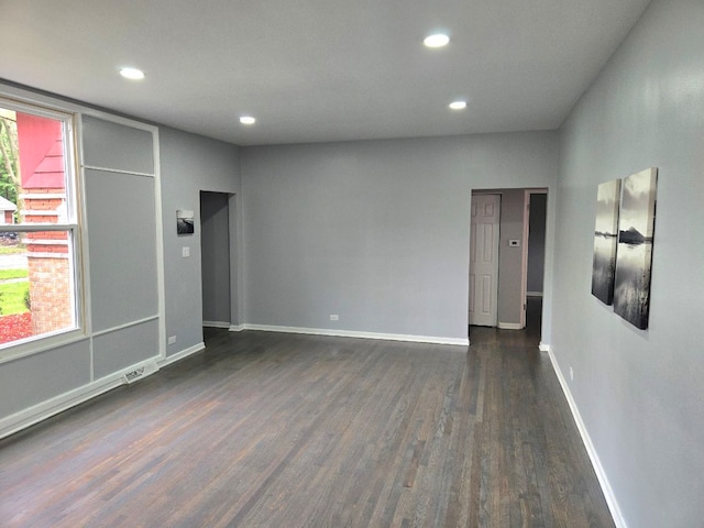 926 Braemar Rd, Flossmoor, IL 60422 - empty room featuring dark wood-type flooring, recessed lighting, and baseboards
