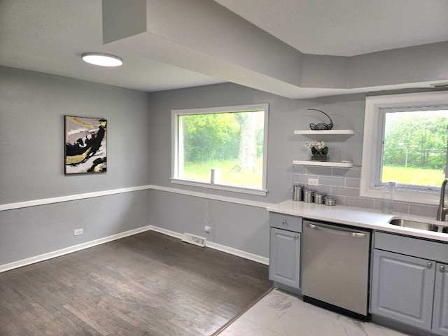 926 Braemar Rd, Flossmoor, IL 60422 - kitchen featuring stainless steel dishwasher, a sink, gray cabinets, and healthy amount of natural light