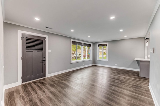 328 Nassau St, Park Forest, IL 60466 - unfurnished living room with baseboards, recessed lighting, wood finished floors, and crown molding