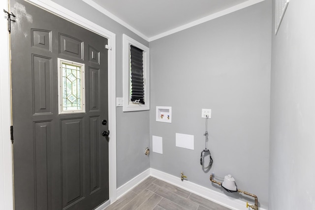 328 Nassau St, Park Forest, IL 60466 - laundry room featuring baseboards, hookup for a gas dryer, washer hookup, crown molding, and wood finish floors