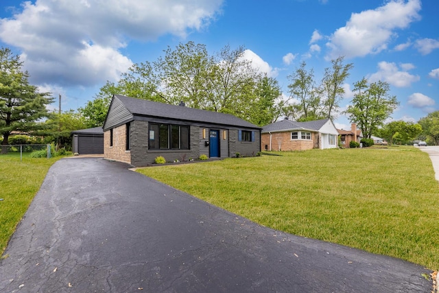 328 Nassau St, Park Forest, IL 60466 - single story home featuring a detached garage, stone siding, an outdoor structure, and brick siding
