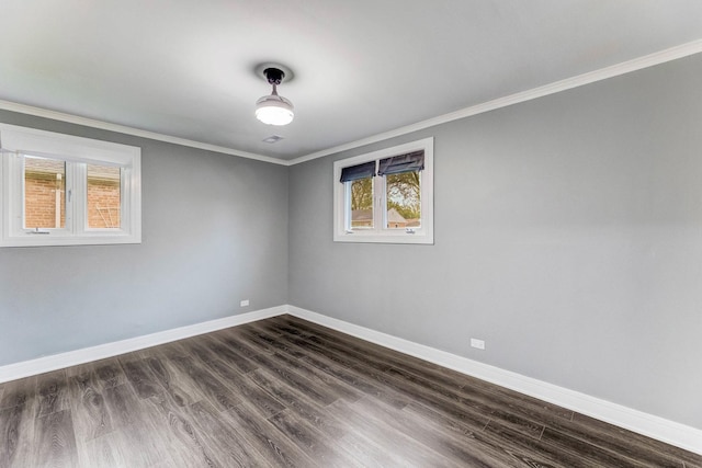 328 Nassau St, Park Forest, IL 60466 - unfurnished room featuring crown molding, healthy amount of natural light, baseboards, and dark wood-style floors