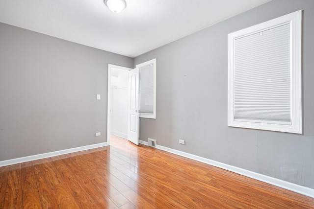 5701 N Mobile Ave, Chicago, IL 60646 - spare room with light wood finished floors and baseboards