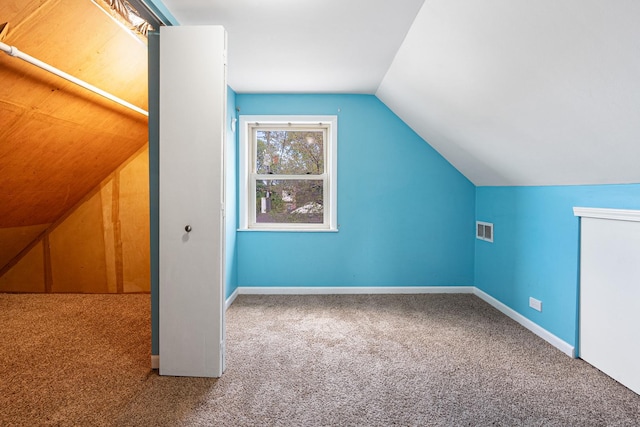5701 N Mobile Ave, Chicago, IL 60646 - bonus room with carpet floors, lofted ceiling, and baseboards