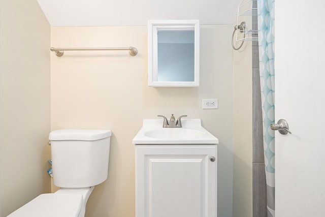 5701 N Mobile Ave, Chicago, IL 60646 - bathroom with toilet, vanity, and curtained shower