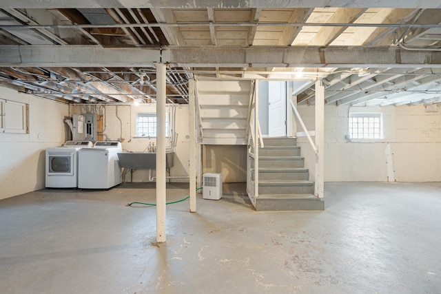 5701 N Mobile Ave, Chicago, IL 60646 - below grade area with separate washer and dryer, electric panel, a sink, and stairway