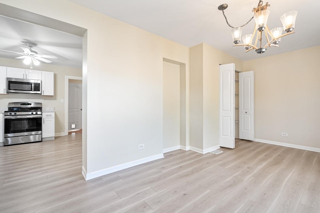 5701 N Mobile Ave, Chicago, IL 60646 - unfurnished dining area with light wood-style flooring, a chandelier, baseboards, and a ceiling fan