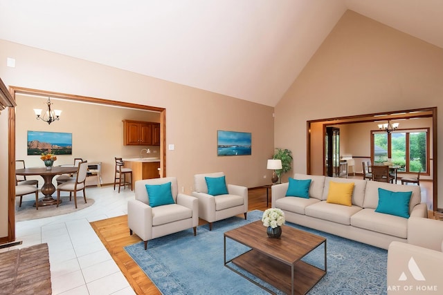 10801 Jillian Rd, Orland Park, IL 60467 - living room with a chandelier, high vaulted ceiling, and light tile patterned flooring