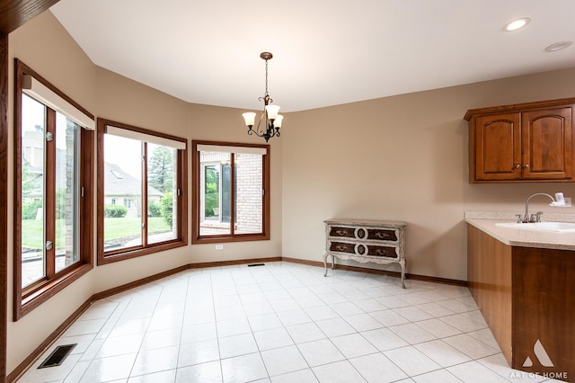 10801 Jillian Rd, Orland Park, IL 60467 - unfurnished dining area with a sink, a chandelier, baseboards, and recessed lighting