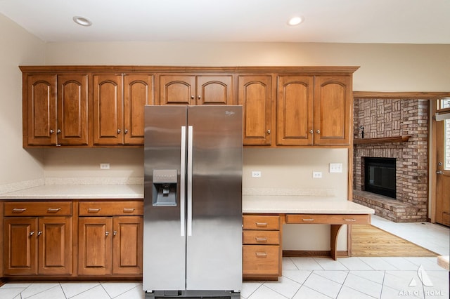 10801 Jillian Rd, Orland Park, IL 60467 - kitchen featuring stainless steel refrigerator with ice dispenser, light tile patterned floors, light countertops, brown cabinetry, and recessed lighting